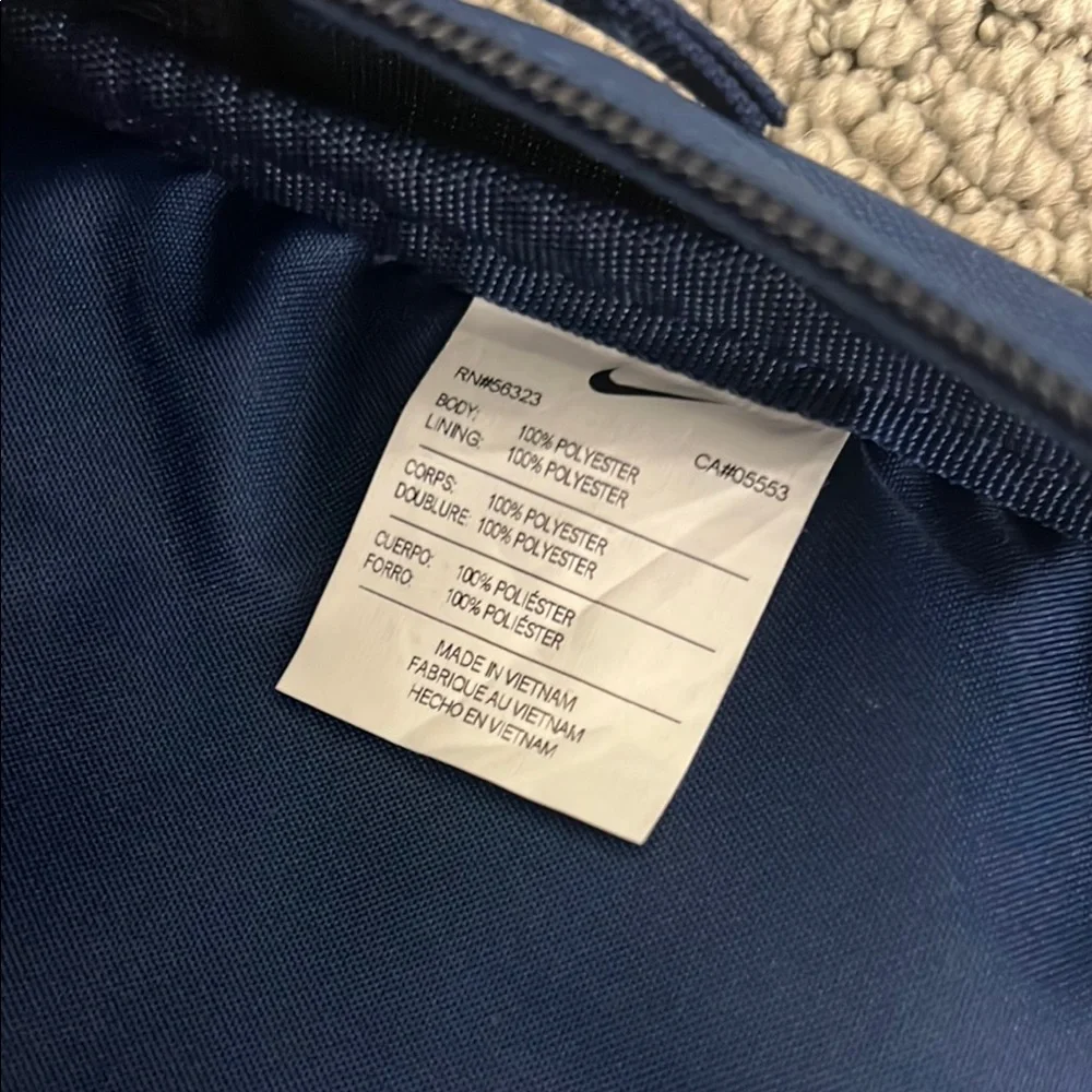 Perfect Mid-Sized Backpack Blue, Purple and Orange nike double zip
